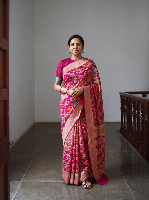 Pink Kutch Bandhani Fine Georgette Banarasi Neem Zari Jaal Saree, draped and worn by a woman, AI visual of the saree, iTokri