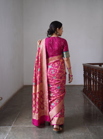 Pink Kutch Bandhani Fine Georgette Banarasi Neem Zari Jaal Saree, draped and worn by a woman, AI visual of the saree, iTokri