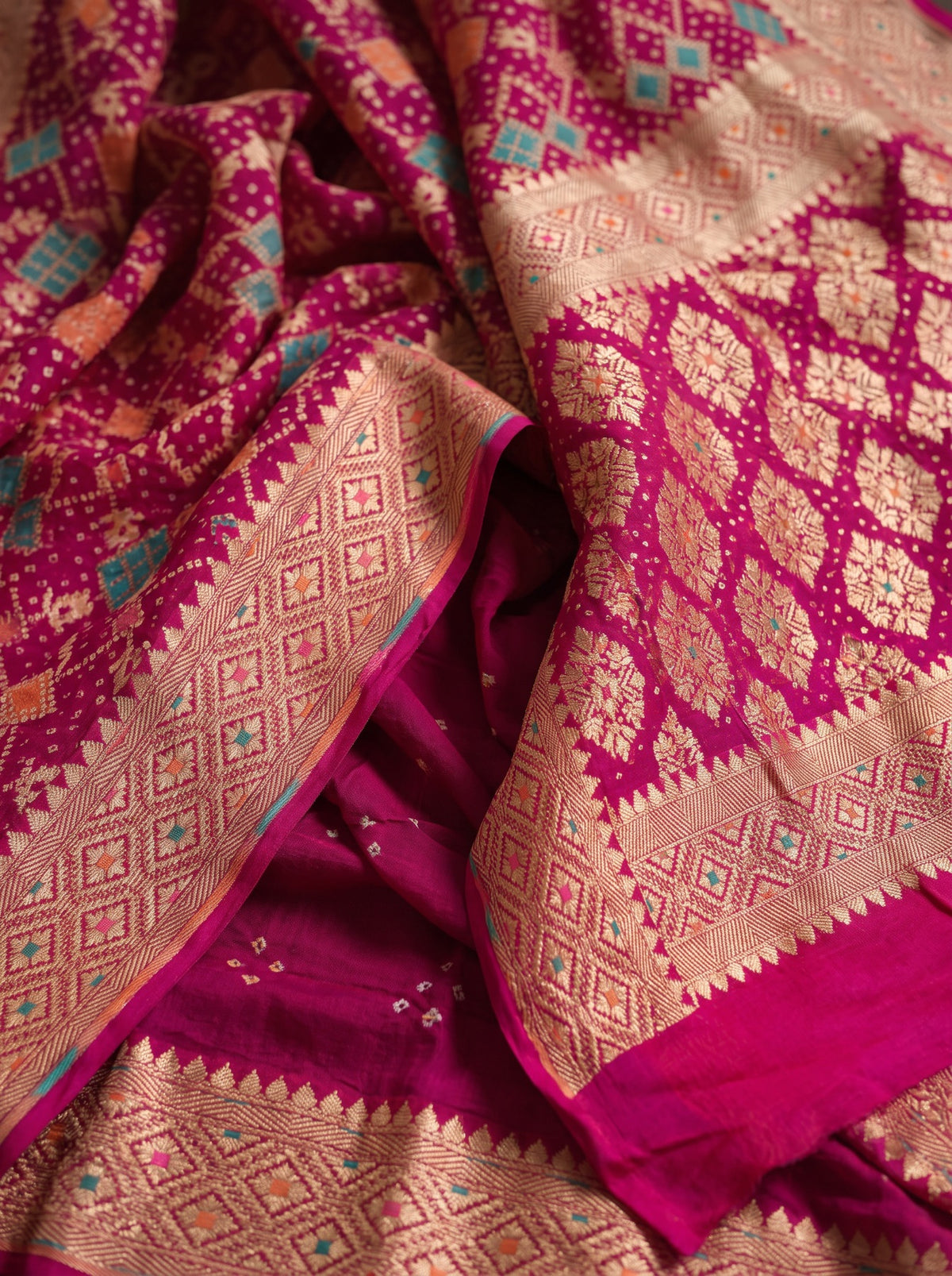 Pink Kutch Bandhani Fine Georgette Banarasi Neem Zari Jaal Saree, draped and worn by a woman, AI visual of the saree, iTokri