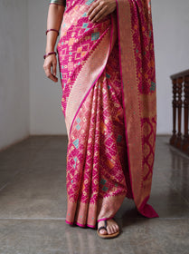 Pink Kutch Bandhani Fine Georgette Banarasi Neem Zari Jaal Saree, draped and worn by a woman, AI visual of the saree, iTokri