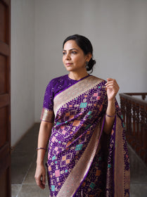 Purple Kutch Bandhani Fine Georgette Banarasi Neem Zari Jaal Saree, draped and worn by a woman, AI visual of the saree, iTokri