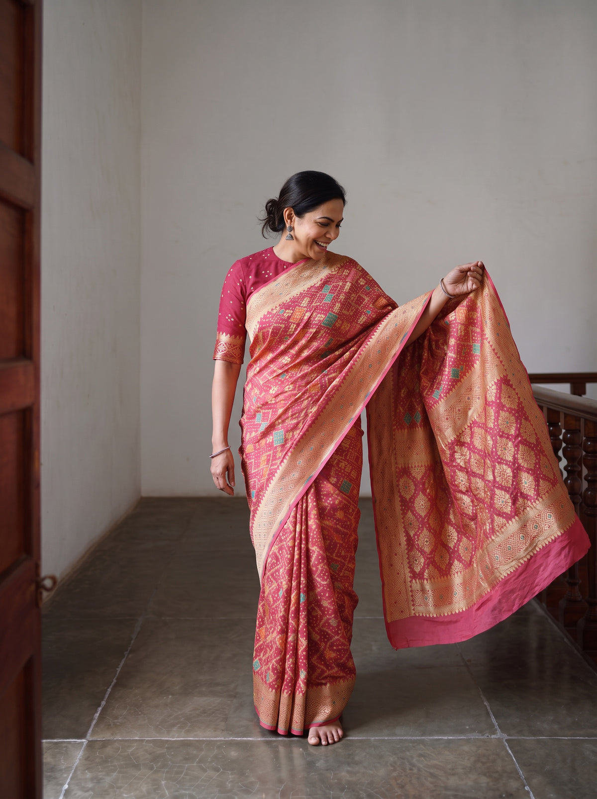 Peach Kutch Bandhani Fine Georgette Banarasi Neem Zari Jaal Saree, draped and worn by a woman, AI visual of the saree, iTokri