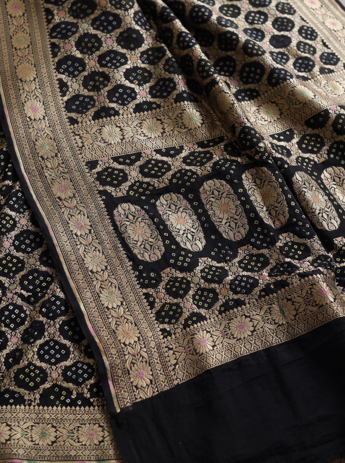 Black Kutch Bandhani Fine Georgette Banarasi Neem Zari Jaal Saree, draped and worn by a woman, AI visual of the saree, iTokri