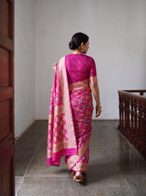 Pink Kutch Bandhani Fine Georgette Banarasi Neem Zari Jaal Saree, draped and worn by a woman, AI visual of the saree, iTokri