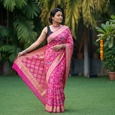 Pink Kutch Bandhani Fine Georgette Banarasi Neem Zari Jaal Saree, draped and worn by a woman, AI visual of the saree, iTokri