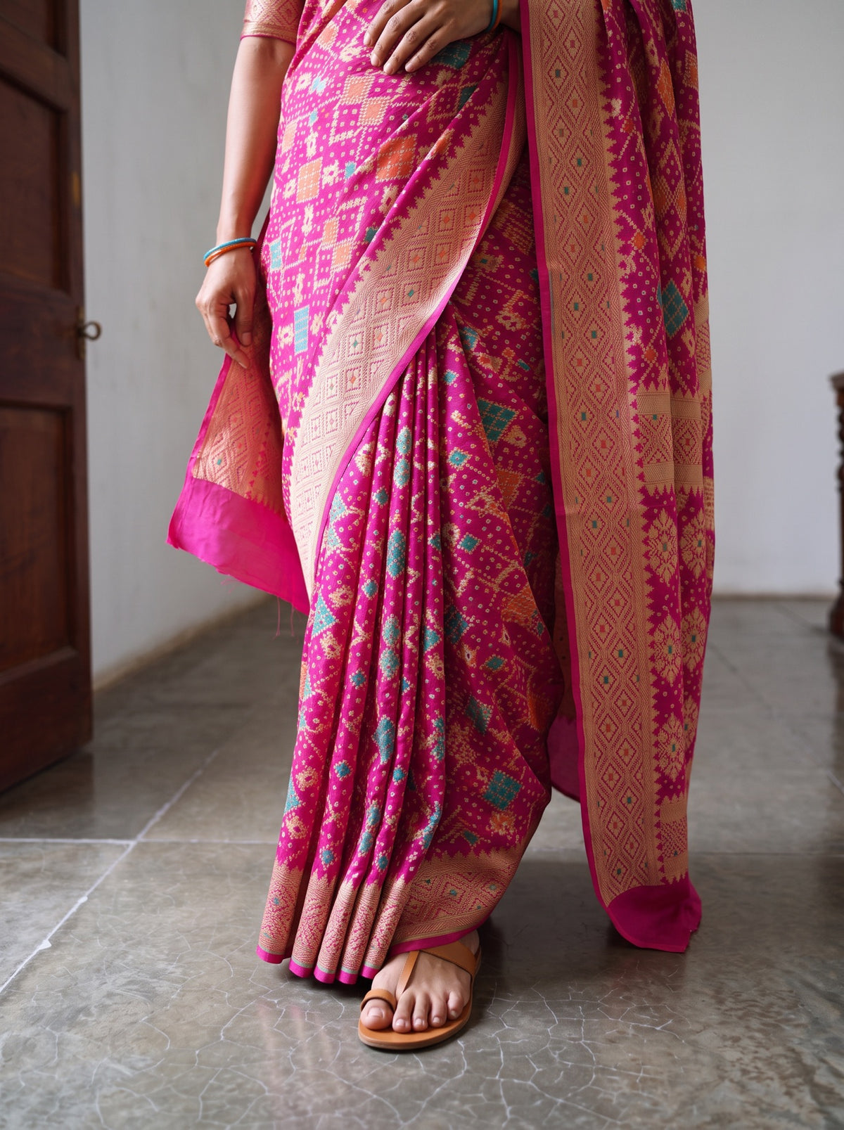 Pink Kutch Bandhani Fine Georgette Banarasi Neem Zari Jaal Saree, draped and worn by a woman, AI visual of the saree, iTokri