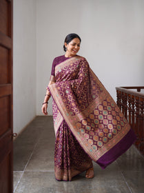 Maroon Kutch Bandhani Fine Georgette Banarasi Neem Zari Jaal Saree, draped and worn by a woman, AI visual of the saree, iTokri