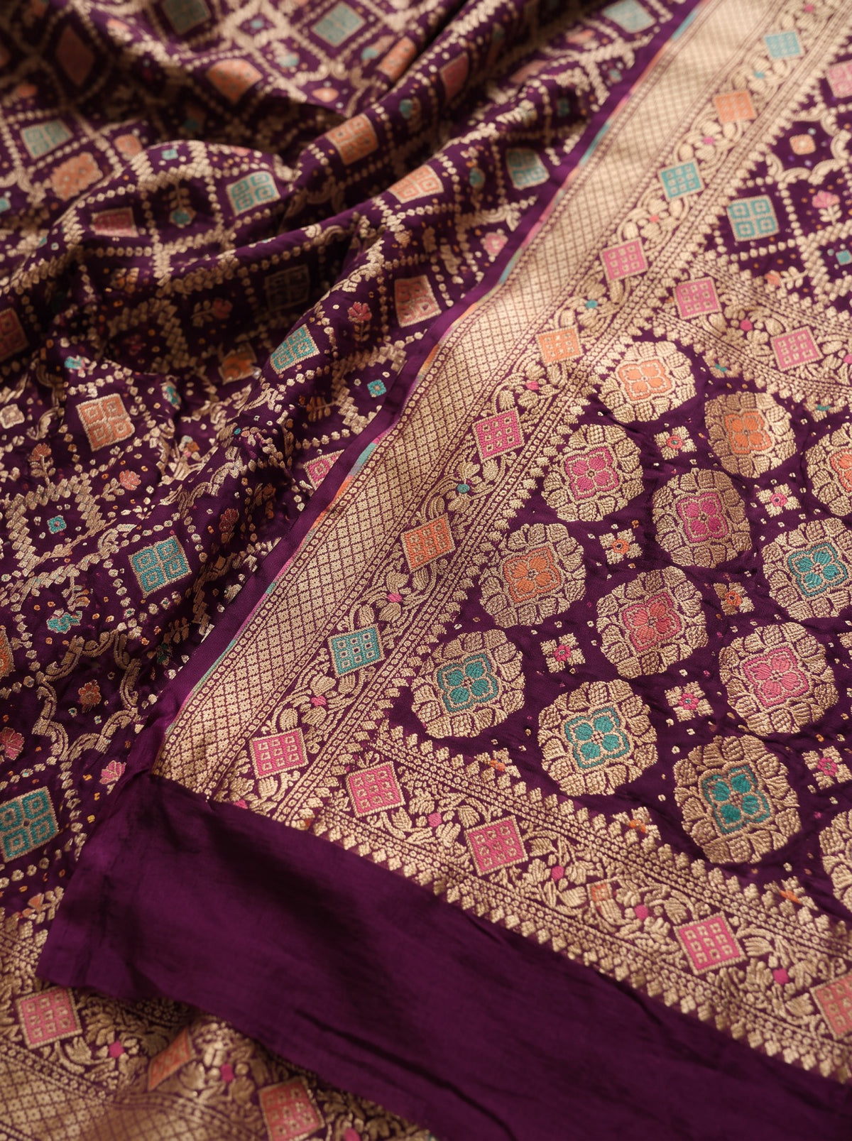 Maroon Kutch Bandhani Fine Georgette Banarasi Neem Zari Jaal Saree, draped and worn by a woman, AI visual of the saree, iTokri
