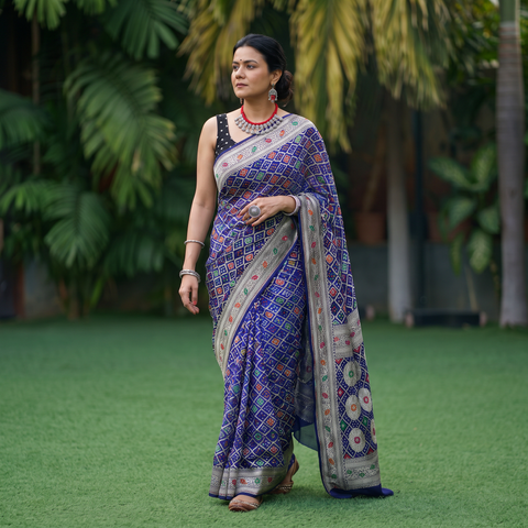 Blue Kutch Bandhani Fine Georgette Banarasi Neem Zari Jaal Saree, draped and worn by a woman, AI visual of the saree, iTokri