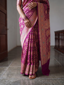 Pink Kutch Bandhani Fine Georgette Banarasi Neem Zari Jaal Saree, draped and worn by a woman, AI visual of the saree, iTokri