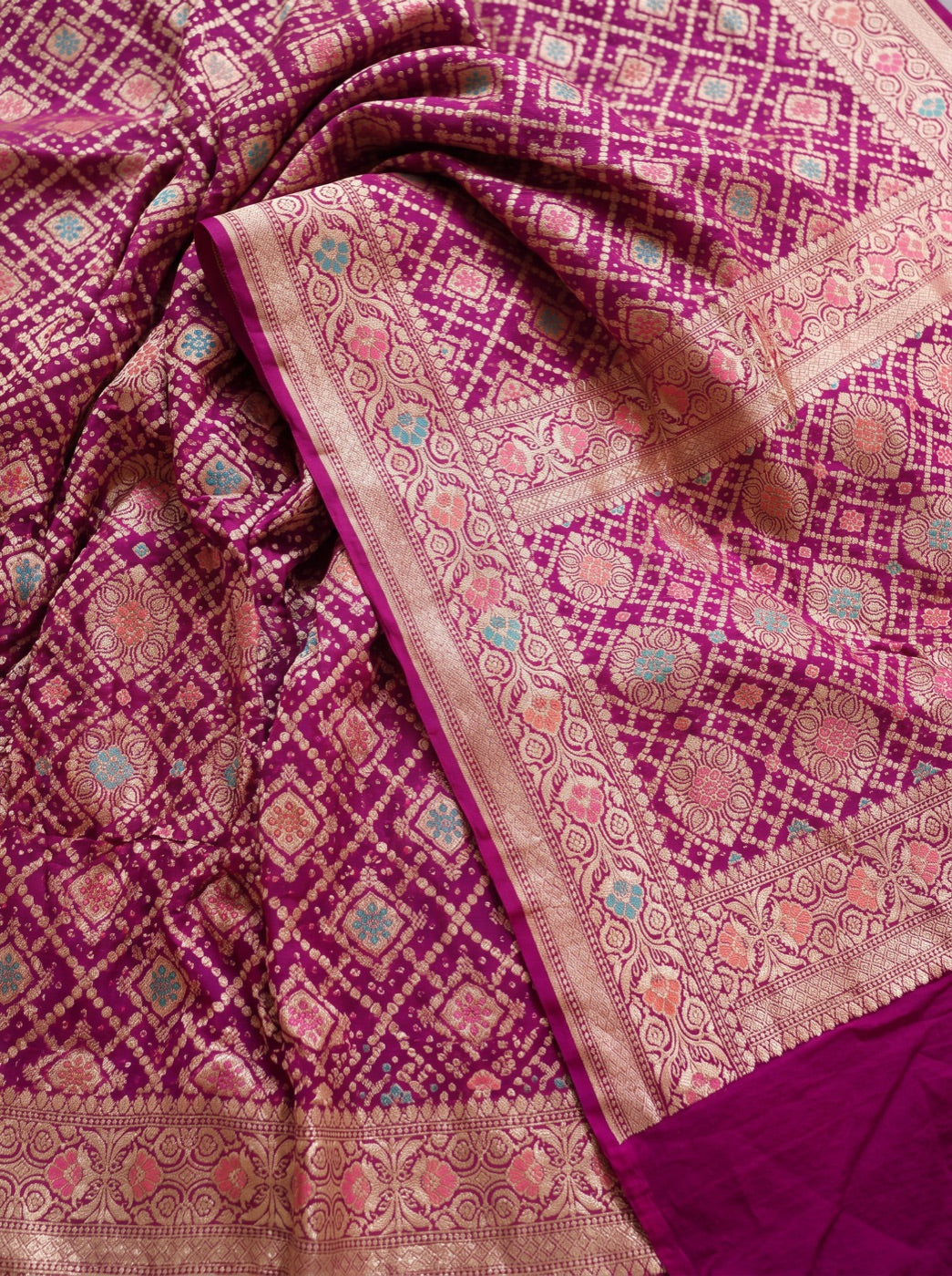 Pink Kutch Bandhani Fine Georgette Banarasi Neem Zari Jaal Saree, draped and worn by a woman, AI visual of the saree, iTokri