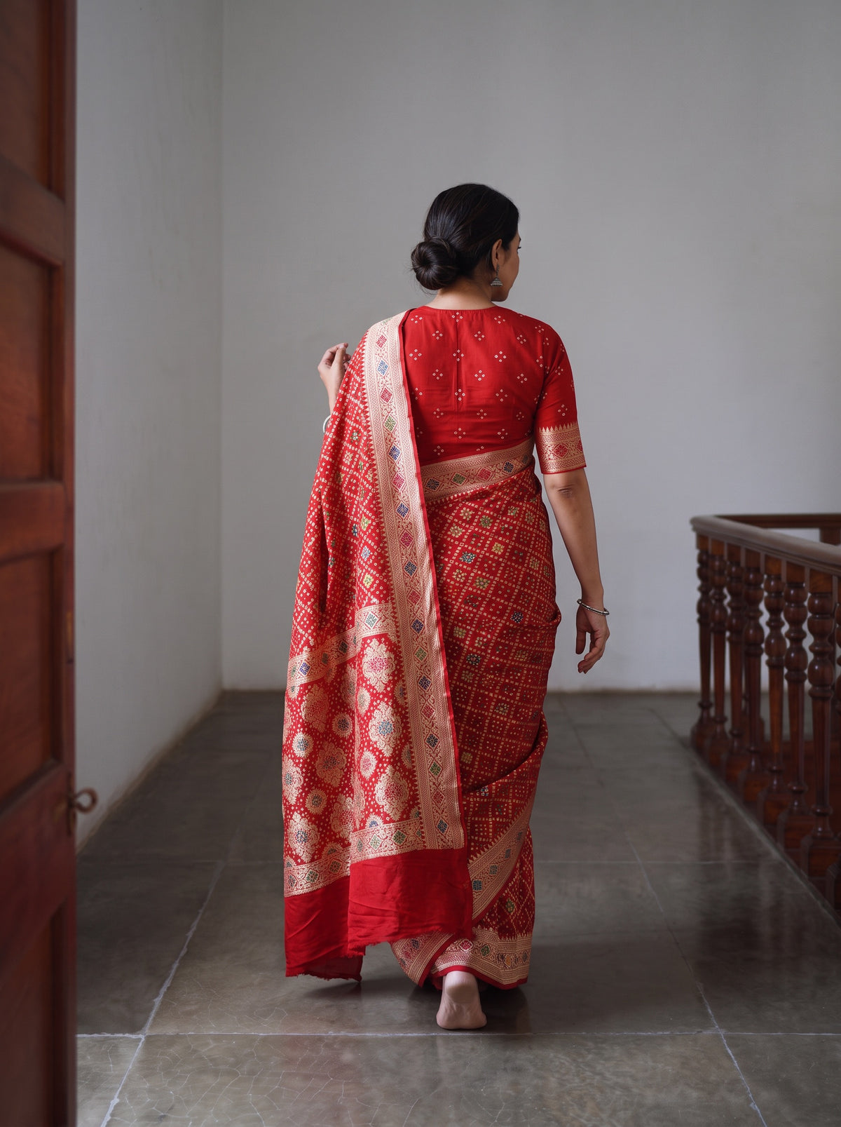 Red Kutch Bandhani Fine Georgette Banarasi Neem Zari Jaal Saree, draped and worn by a woman, AI visual of the saree, iTokri