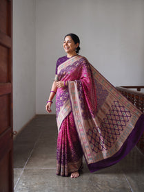 Pink Kutch Bandhani Fine Georgette Banarasi Neem Zari Jaal Saree, draped and worn by a woman, AI visual of the saree, iTokri