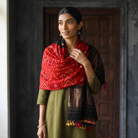 Red Kutch Bandhani Handwoven Merino Wool Shawl with Zari Patta, worn by a model, AI visual of the shawl, iTokri