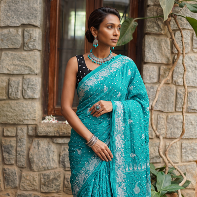 Green Kutch Bandhani tie-dye cotton saree, draped and worn by a woman, AI visual of the saree, iTokri