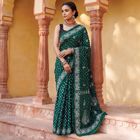 Green Kutch Bandhani tie-dye cotton saree, draped and worn by a woman, AI visual of the saree, iTokri