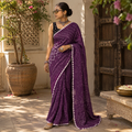 Purple Kutch Bandhani tie-dye cotton saree, draped and worn by a woman, AI visual of the saree, iTokri
