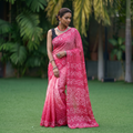 Pink Kutch Bandhani tie-dye cotton saree, draped and worn by a woman, AI visual of the saree, iTokri