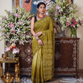 Yellow Kutch Bandhani tie-dye cotton saree, draped and worn by a woman, AI visual of the saree, iTokri