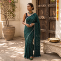 Green Kutch Bandhani tie-dye cotton saree, draped and worn by a woman, AI visual of the saree, iTokri