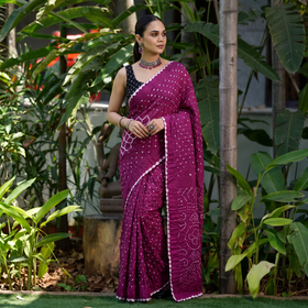 Purple Kutch Bandhani tie-dye cotton saree, draped and worn by a woman, AI visual of the saree, iTokri