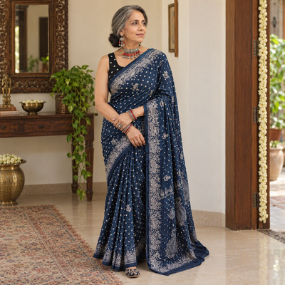 Blue Kutch Bandhani tie-dye cotton saree, draped and worn by a woman, AI visual of the saree, iTokri