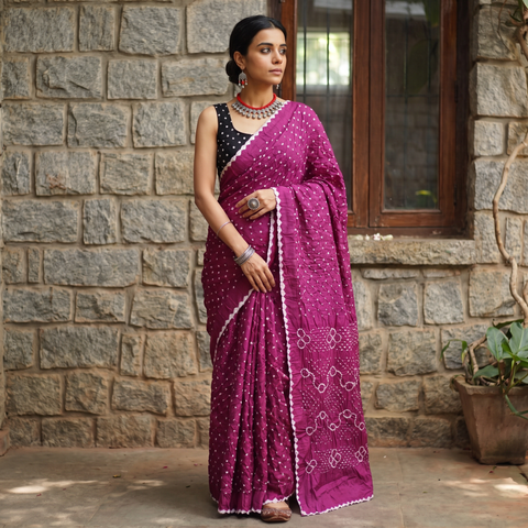 Purple Kutch Bandhani tie-dye cotton saree, draped and worn by a woman, AI visual of the saree, iTokri