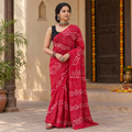 Pink Kutch Bandhani tie-dye cotton saree, draped and worn by a woman, AI visual of the saree, iTokri