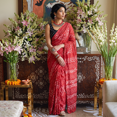 Pink Kutch Bandhani tie-dye cotton saree, draped and worn by a woman, AI visual of the saree, iTokri