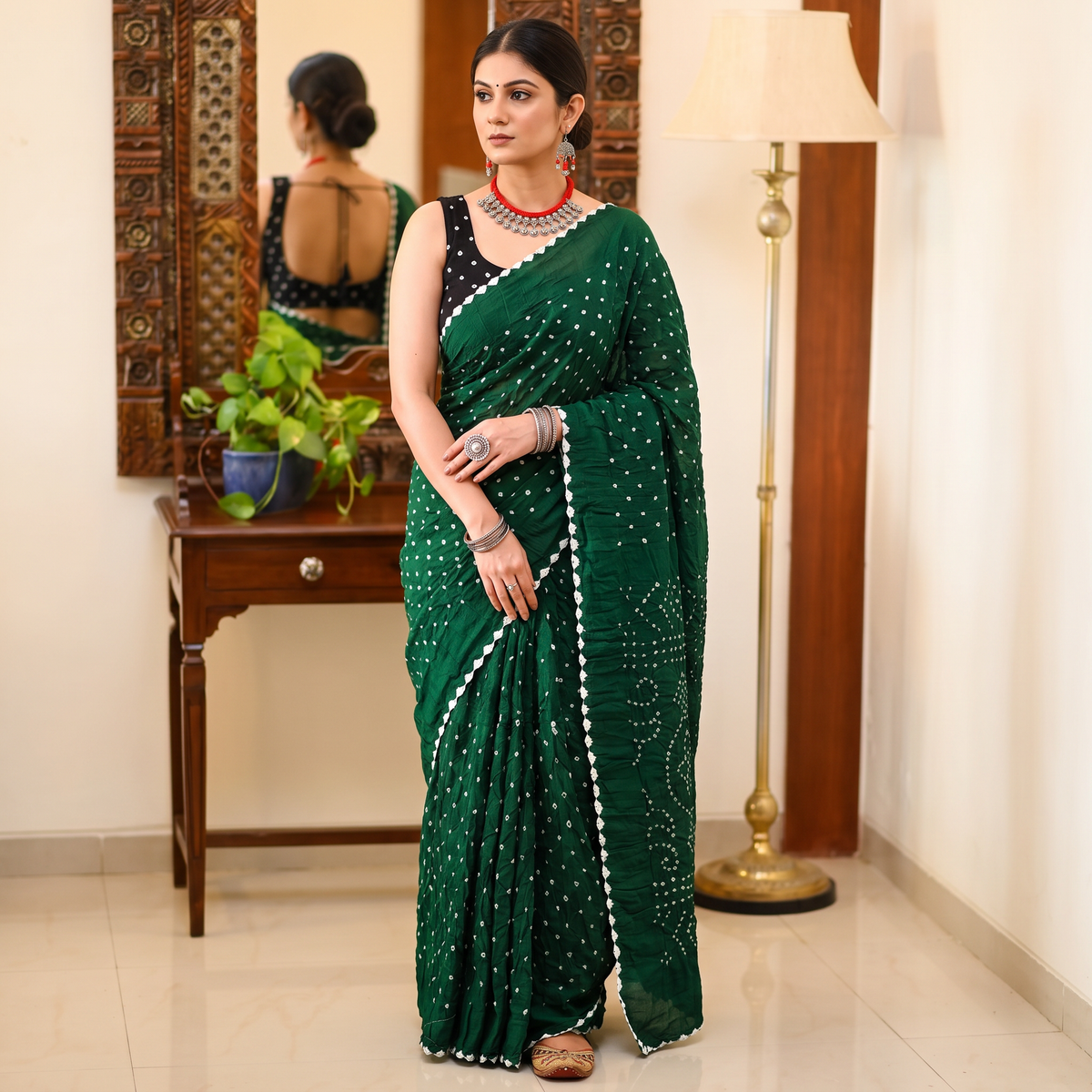 Green Kutch Bandhani tie-dye cotton saree, draped and worn by a woman, AI visual of the saree, iTokri