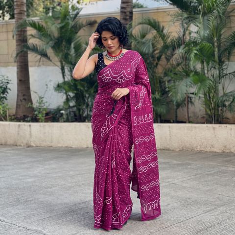 Purple Kutch Bandhani tie-dye cotton saree, draped and worn by a woman, AI visual of the saree, iTokri