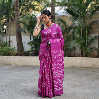 Purple Kutch Bandhani tie-dye cotton saree, draped and worn by a woman, AI visual of the saree, iTokri