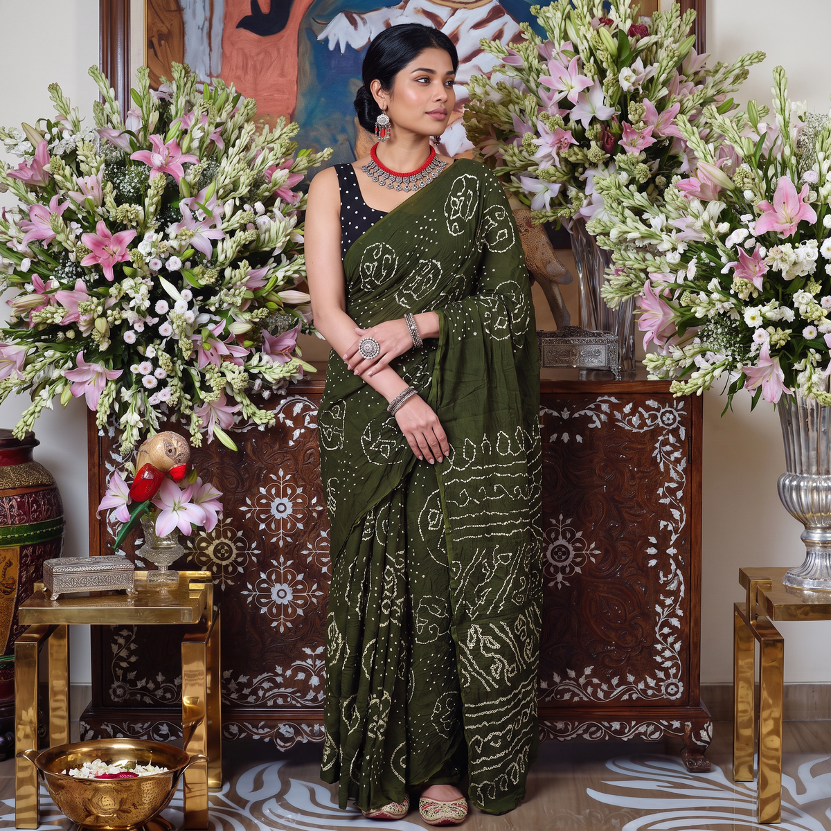 Green Kutch Bandhani tie-dye cotton saree, draped and worn by a woman, AI visual of the saree, iTokri
