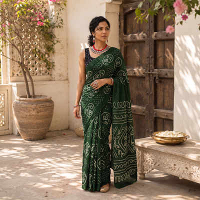 Green Kutch Bandhani tie-dye cotton saree, draped and worn by a woman, AI visual of the saree, iTokri