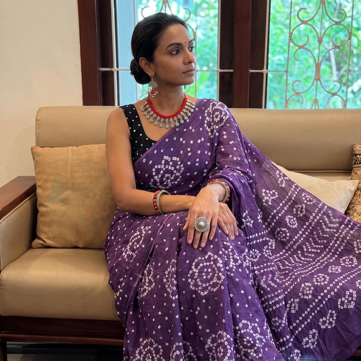 Purple Kutch Bandhani tie-dye cotton saree, draped and worn by a woman, AI visual of the saree, iTokri