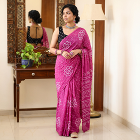 Purple Kutch Bandhani tie-dye cotton saree, draped and worn by a woman, AI visual of the saree, iTokri
