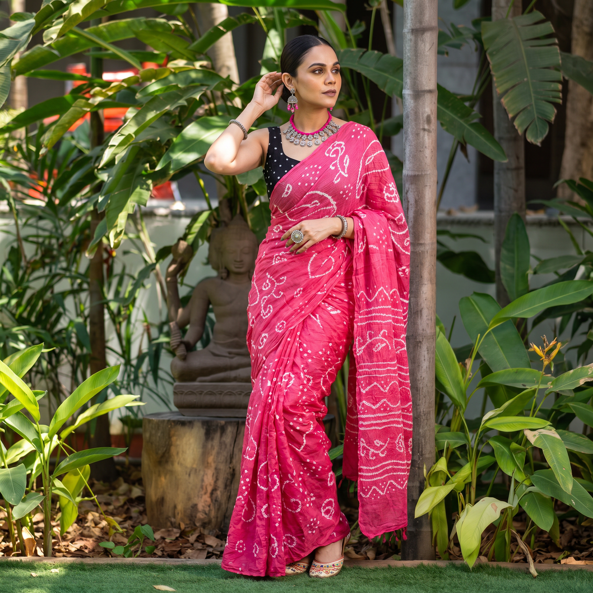 Pink Kutch Bandhani tie-dye cotton saree, draped and worn by a woman, AI visual of the saree, iTokri