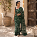 Green Kutch Bandhani tie-dye cotton saree, draped and worn by a woman, AI visual of the saree, iTokri