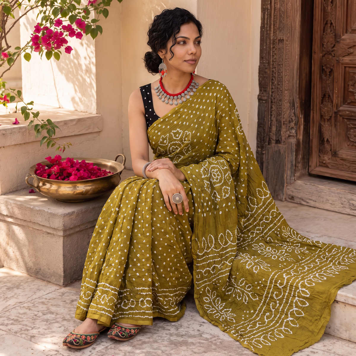 Green Kutch Bandhani tie-dye cotton saree, draped and worn by a woman, AI visual of the saree, iTokri