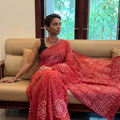 Pink Kutch Bandhani tie-dye cotton saree, draped and worn by a woman, AI visual of the saree, iTokri