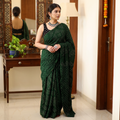 Green Kutch Bandhani tie-dye cotton saree, draped and worn by a woman, AI visual of the saree, iTokri