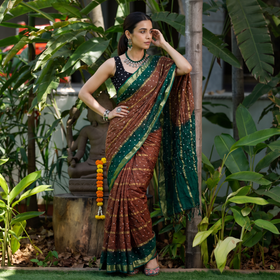 Brown Kutch Bandhani tie-dye cotton saree, draped and worn by a woman, AI visual of the saree, iTokri