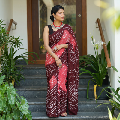 Maroon Kutch Bandhani tie-dye cotton saree, draped and worn by a woman, AI visual of the saree, iTokri