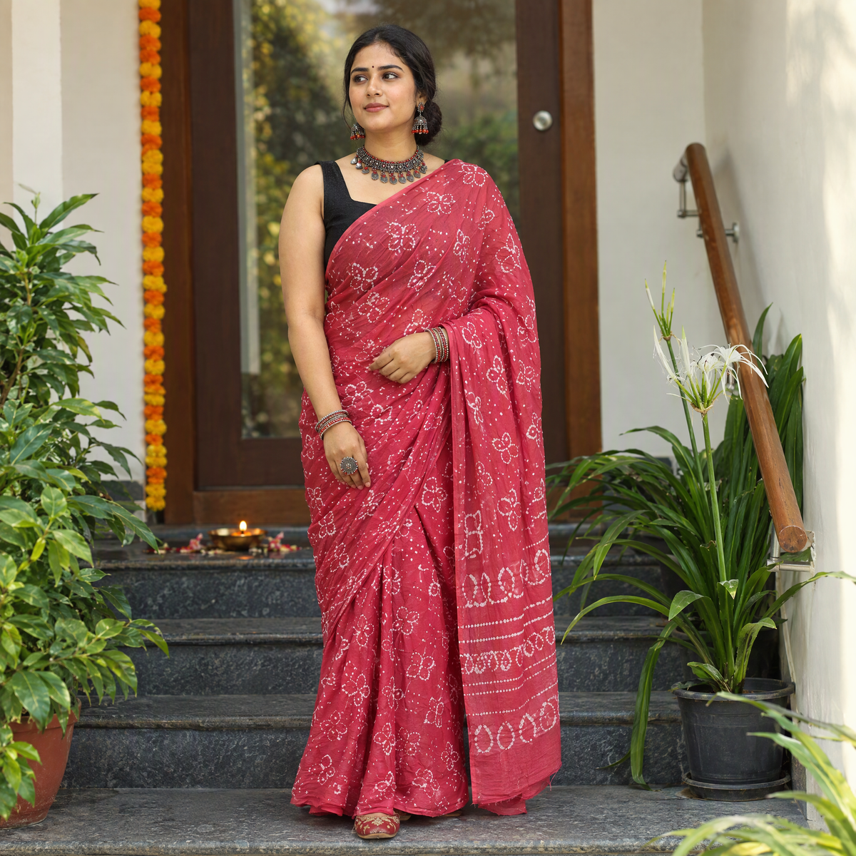 Pink Kutch Bandhani tie-dye cotton saree, draped and worn by a woman, AI visual of the saree, iTokri