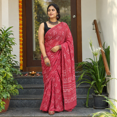 Pink Kutch Bandhani tie-dye cotton saree, draped and worn by a woman, AI visual of the saree, iTokri