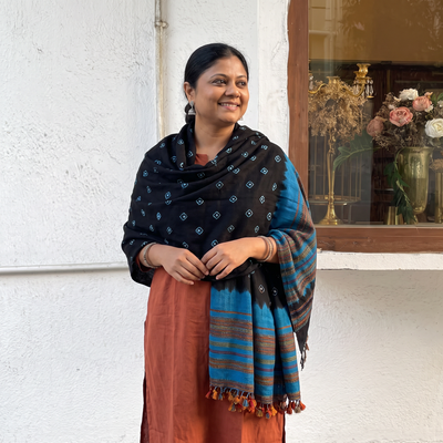 Black Kutch Bandhani Tie-Dye Handwoven Merino Wool Shawl, worn by a model, AI visual of the shawl, iTokri