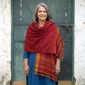 Red Kutch Bandhani Tie-Dye Handwoven Merino Wool Shawl, worn by a model, AI visual of the shawl, iTokri