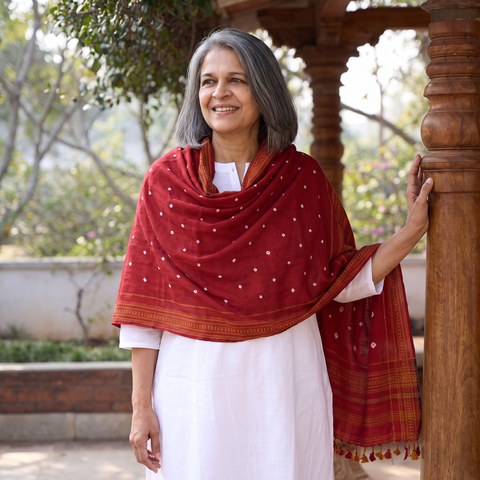 Red Kutch Bandhani Tie-Dye Handwoven Merino Wool Shawl, worn by a model, AI visual of the shawl, iTokri