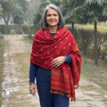Red Kutch Bandhani Tie-Dye Handwoven Merino Wool Shawl, worn by a model, AI visual of the shawl, iTokri
