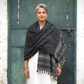 Black Kutch Bhujodi Handwoven Merino Wool Shawl, worn by a model, AI visual of the shawl, iTokri